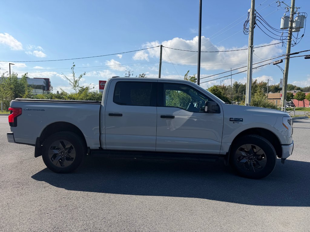 2024 Ford F-150 Lightning XLT in Saint-Hyacinthe, Quebec - 2 - w1024h768px