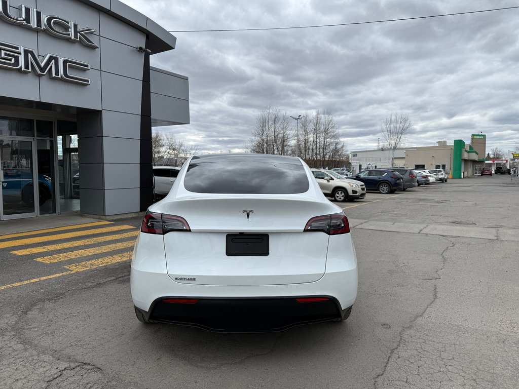 2024 Tesla Model Y STD RANGE in Drummondville, Quebec - 4 - w1024h768px