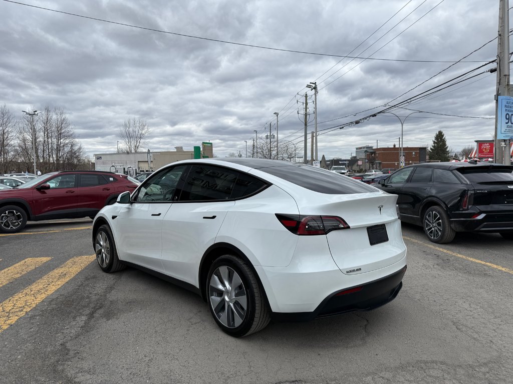 2024 Tesla Model Y STD RANGE in Drummondville, Quebec - 5 - w1024h768px