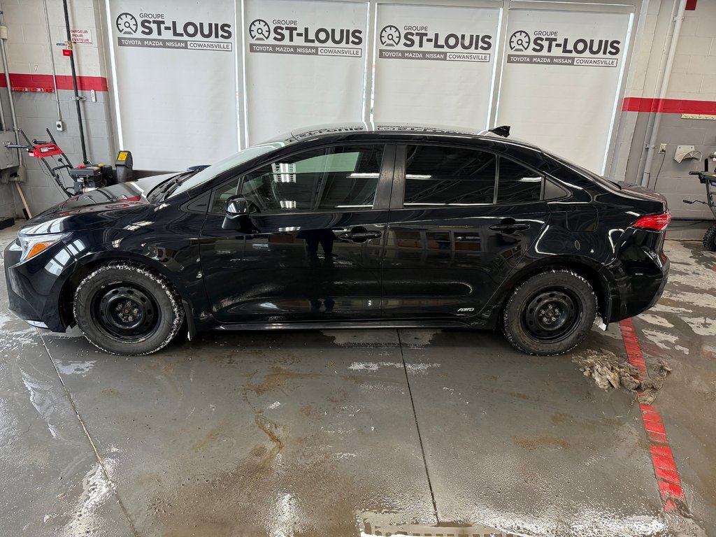 Toyota COROLLA HYBRID LE AWD 2023 à Cowansville, Québec - 3 - w1024h768px