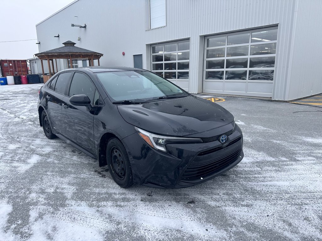 2023 Toyota COROLLA HYBRID LE AWD in Cowansville, Quebec - 1 - w1024h768px