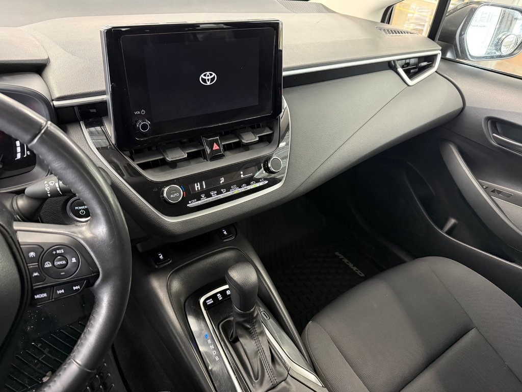 Toyota COROLLA HYBRID LE AWD 2023 à Cowansville, Québec - 16 - w1024h768px
