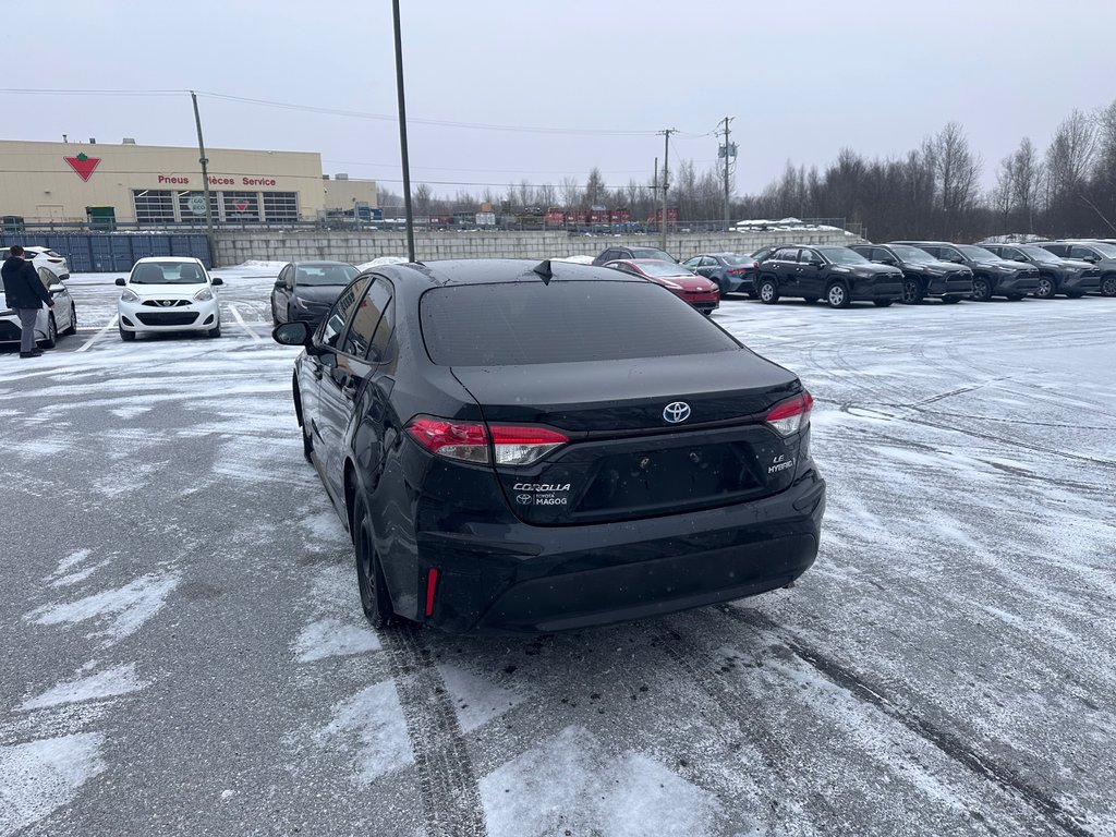 2023 Toyota COROLLA HYBRID LE AWD in Cowansville, Quebec - 3 - w1024h768px