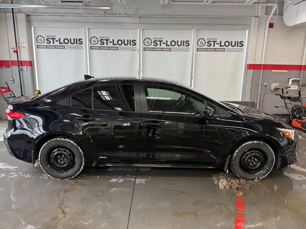 Toyota COROLLA HYBRID LE AWD 2023 à Cowansville, Québec - 6 - w1024h768px
