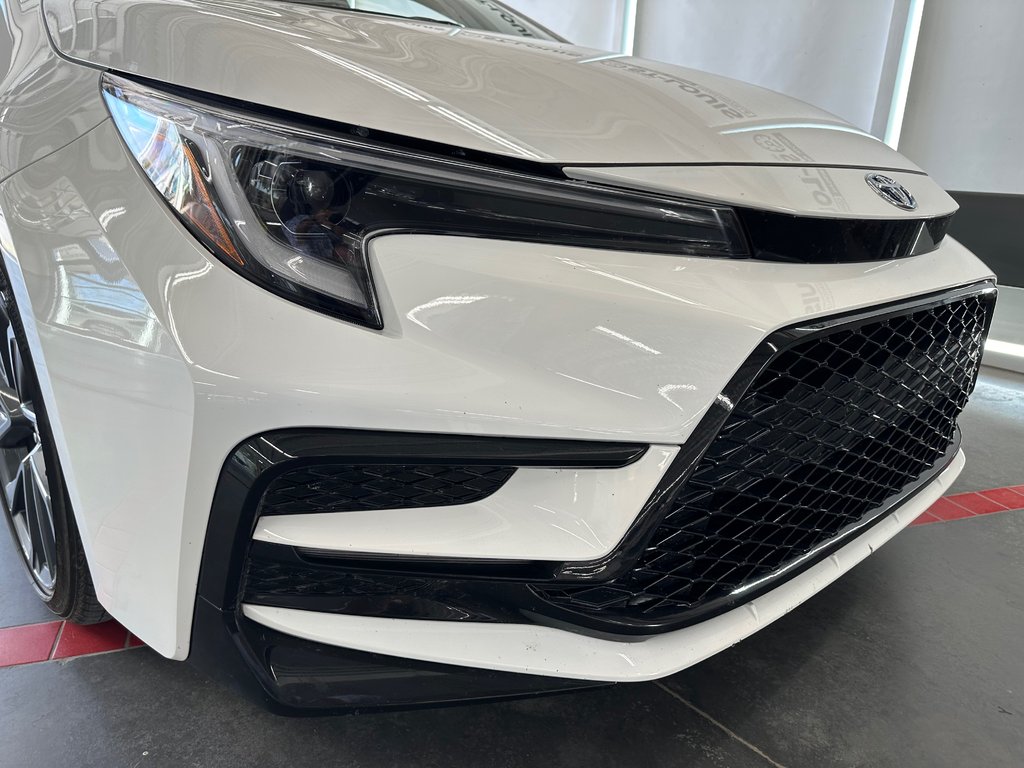 2025 Toyota COROLLA HYBRID SE AWD in Cowansville, Quebec - 15 - w1024h768px