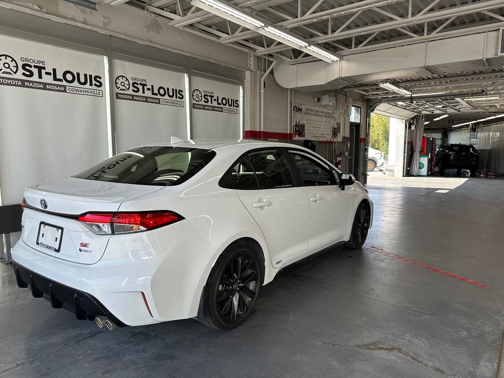 2025 Toyota COROLLA HYBRID SE AWD in Cowansville, Quebec - 9 - w1024h768px