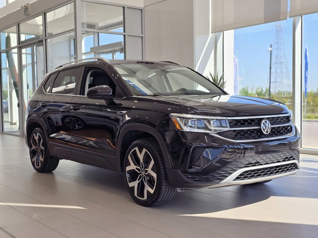 Volkswagen Taos Highline PANO | CUIR | CARPLAY | CAM | DÉMARREUR 2022 à Laval, Québec - 1 - w1024h768px