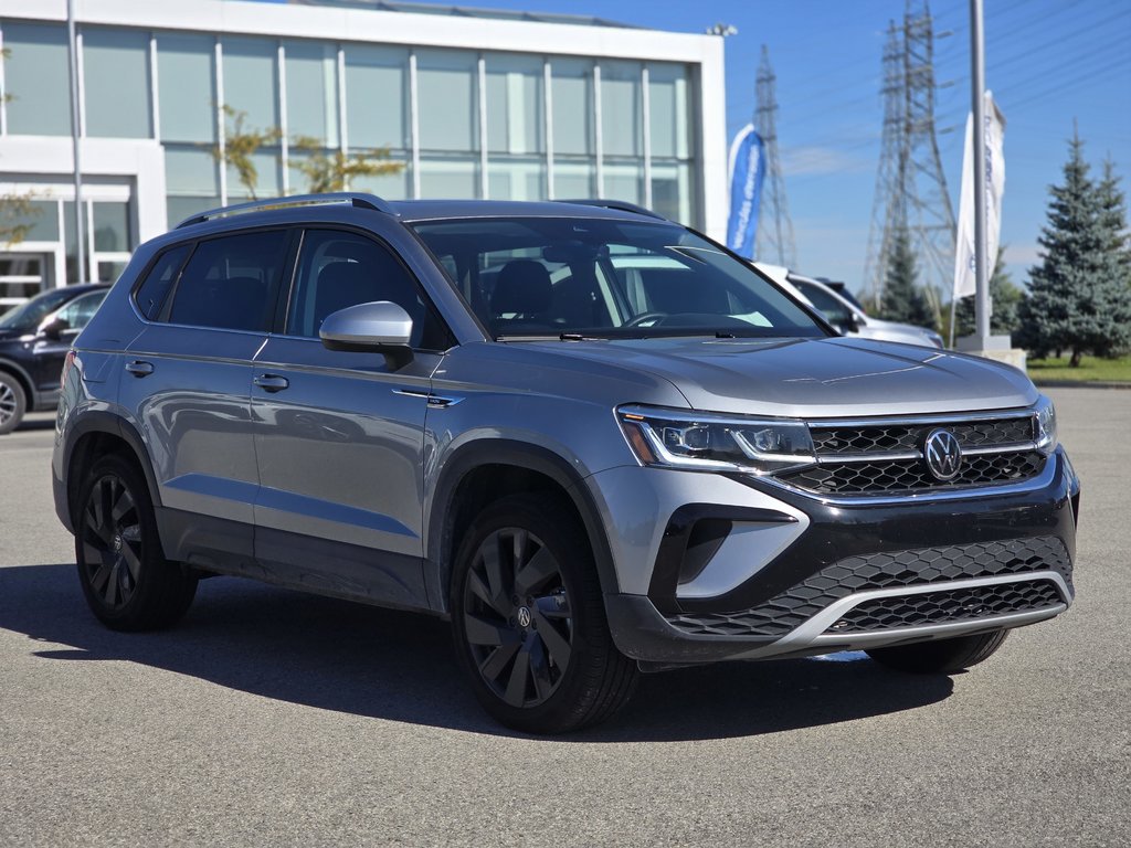 2023  Taos Highline BAS KM | CUIR | TOIT PANO | CARPLAY | AWD in Laval, Quebec - 1 - w1024h768px