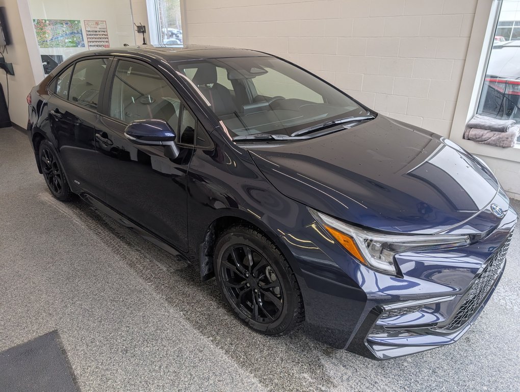 2025 Toyota Corolla HYBRIDE SE AWD in Magog, Quebec - 1 - w1024h768px