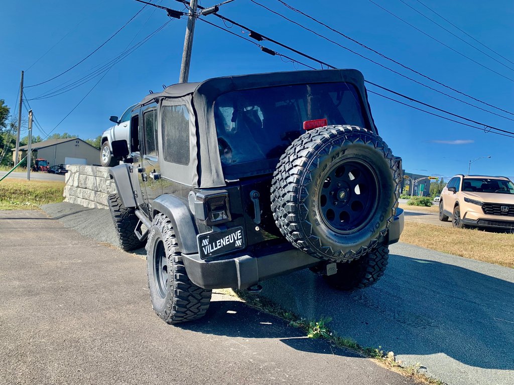 2011 Jeep Wrangler Unlimited Sport in Matane, Quebec - 12 - w1024h768px