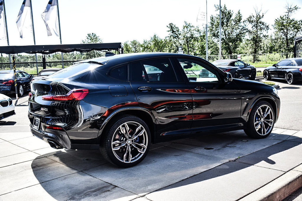 Calgary BMW | 2020 BMW X4 M40i | #N24132 showroom