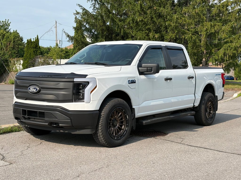 2024 Ford F-150 Lightning Pro in Saint-Sulpice, Quebec - 1 - w1024h768px