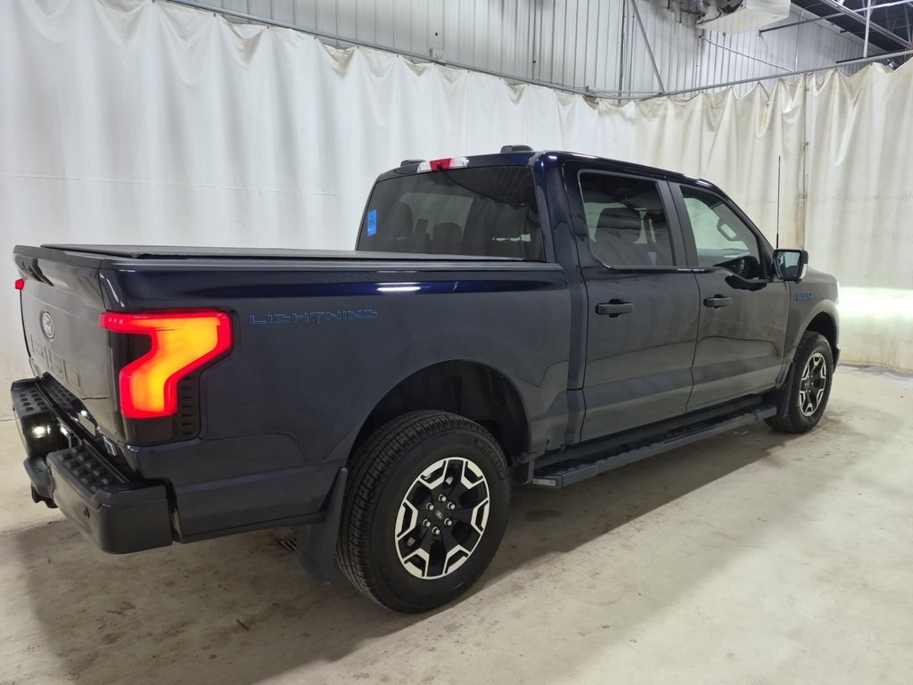 Ford F-150 Lightning Pro 2024 à Repentigny, Québec - 3 - w1024h768px