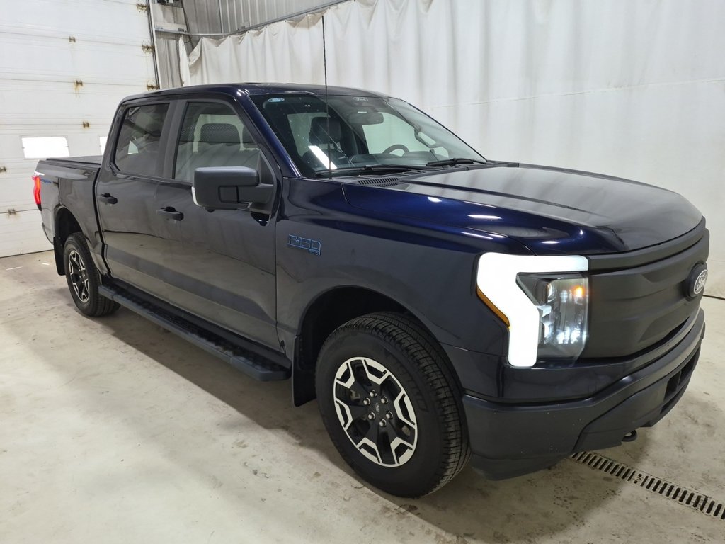 Ford F-150 Lightning Pro 2024 à Repentigny, Québec - 1 - w1024h768px