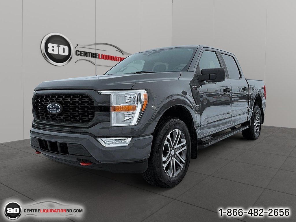 F-150 STX BOITE 5.5 PIED MOTEUR 2.7L 2021 à Granby, Québec - 1 - w1024h768px