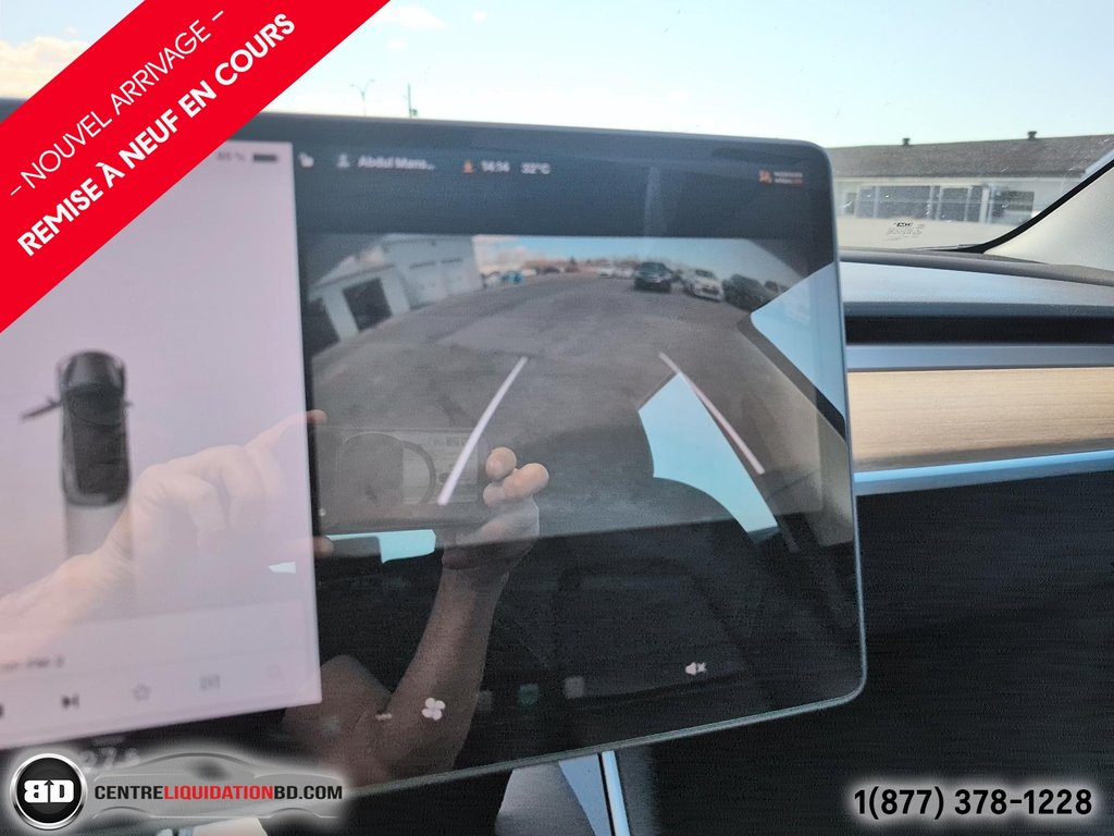 2020 Tesla Model 3 Standard Range Plus in Granby, Quebec - 18 - w1024h768px
