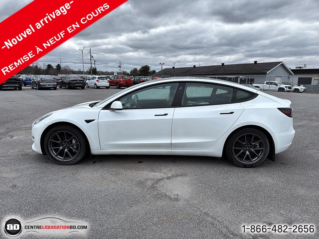 2021 Tesla Model 3 STANDARD RANGE PLUS in Granby, Quebec - 11 - w1024h768px