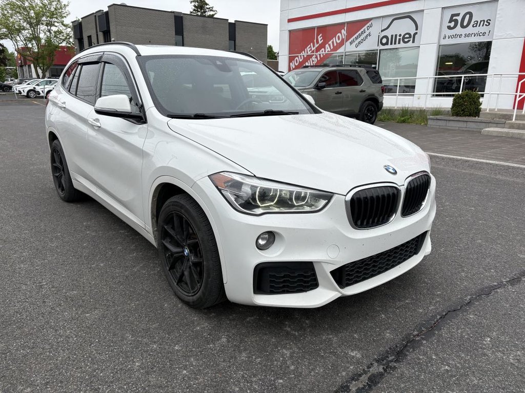 2018 BMW X1 Sports Activity Vehicle in Montréal, Quebec - 1 - w1024h768px