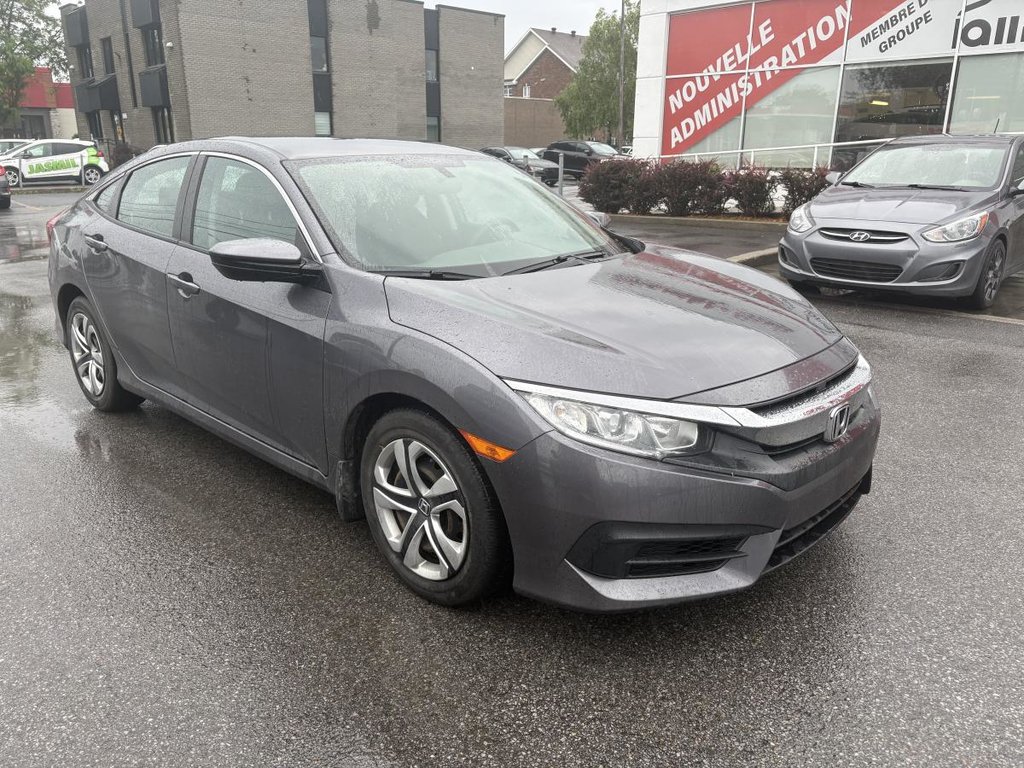 Honda Civic LX 57,000 KM I 10 YEARS//200,000 KIM WARRANTY I CARPLAY I HEATED SEATS I CAMERA I ACTIVE SECURITY 2018 à Montréal, Québec - 2 - w1024h768px