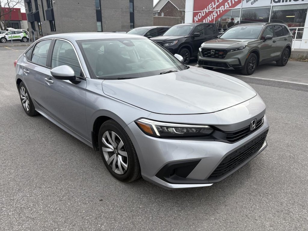 2023 Honda Civic LX 34,000 KM CARPLAY I STERTER I HEATED SEATS I CAMERA I ACTIVE SECURITY in Montréal, Quebec - 2 - w1024h768px