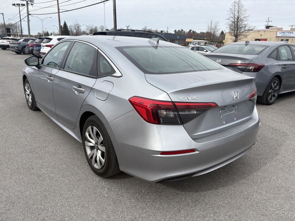 2023 Honda Civic LX 34,000 KM CARPLAY I STERTER I HEATED SEATS I CAMERA I ACTIVE SECURITY in Montréal, Quebec - 4 - w1024h768px