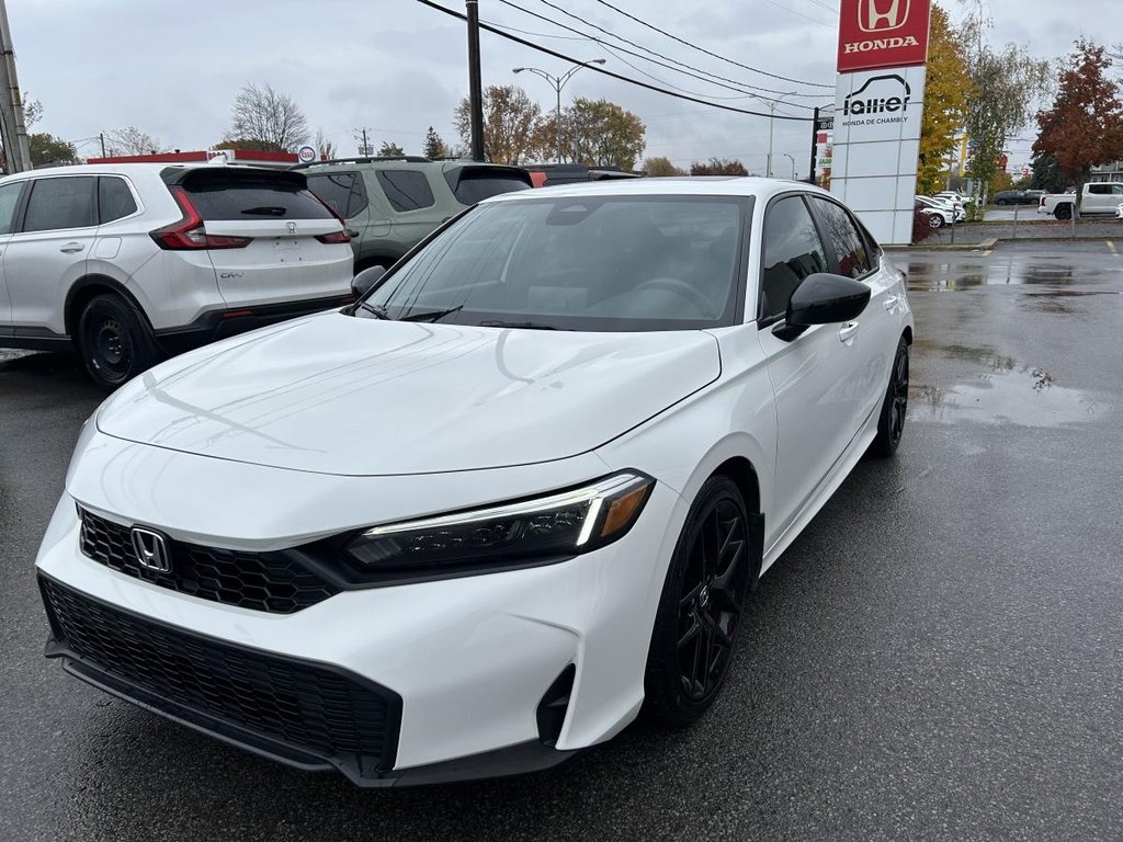 Honda Civic Sport SUNRROF I MAGS HEATED SEATS AND STEERING WHEEL I STARTER I CAMERA I ACIVE SECURITY 2026 à Montréal, Québec - 3 - w1024h768px