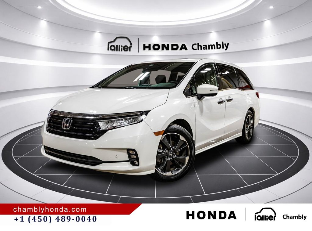 2023 Honda Odyssey Touring 34,000 KM I 8 SEATERS I HEATED LEATHER SEATS I DVD I MAGS I ACTIVE SECURITY in Montréal, Quebec - 1 - w1024h768px