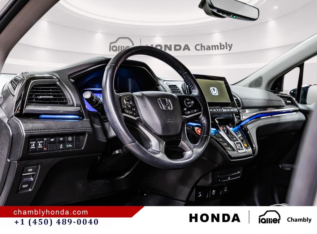 2023 Honda Odyssey Touring 34,000 KM I 8 SEATERS I HEATED LEATHER SEATS I DVD I MAGS I ACTIVE SECURITY in Montréal, Quebec - 21 - w1024h768px