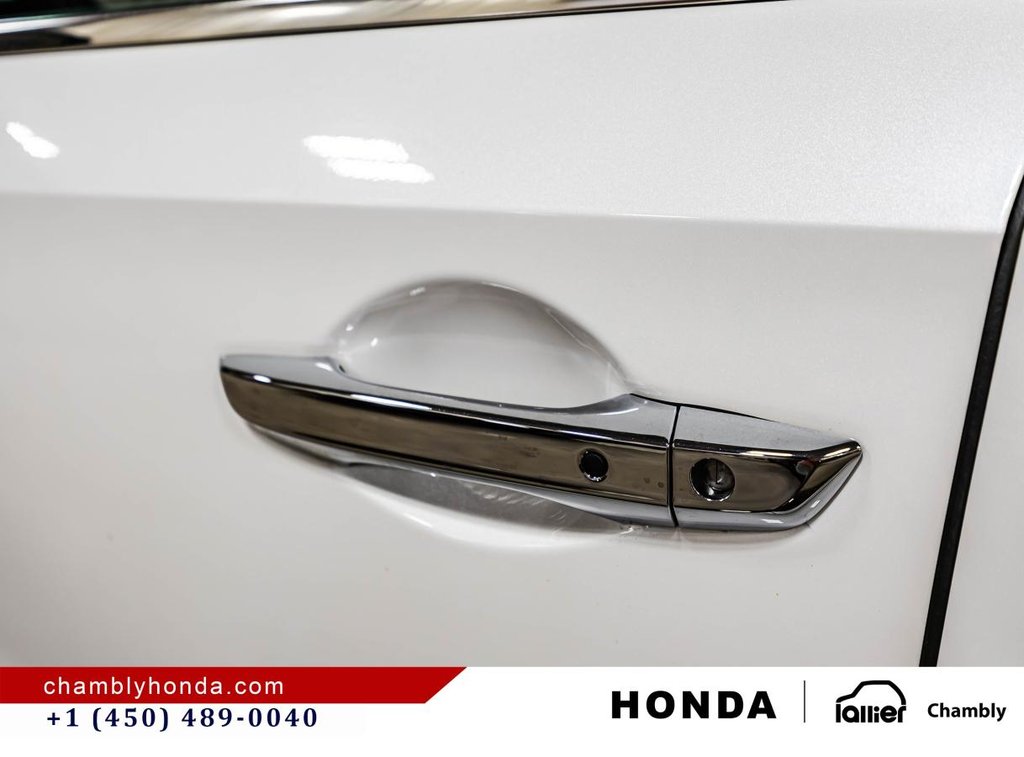 2023 Honda Odyssey Touring 34,000 KM I 8 SEATERS I HEATED LEATHER SEATS I DVD I MAGS I ACTIVE SECURITY in Montréal, Quebec - 11 - w1024h768px