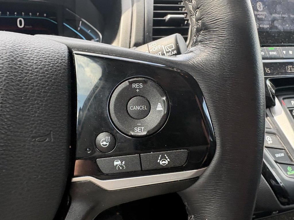 Honda Odyssey EX-L  LEATHERI CARPLAY I SUNROOF I  HEATED SEATS & STEERING WHEEL I CTIVE SECURITY I 7 SEATERS 2024 à Montréal, Québec - 11 - w1024h768px