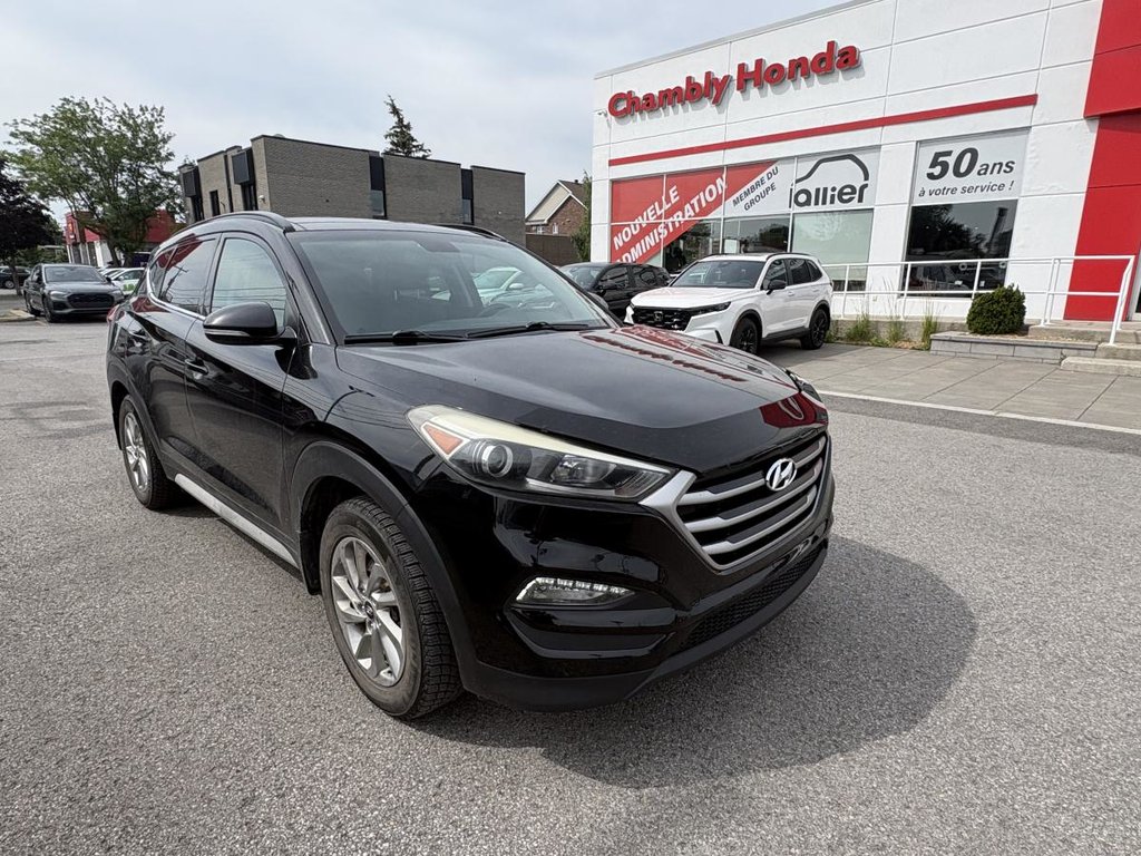 Hyundai Tucson Luxury  AWD I LEATHER I PANORAMIC SUNROOF I HEATED SEATS & STEERING WHEEL I ACTIVE SECURITY I MAGS 2017 à Montréal, Québec - 1 - w1024h768px
