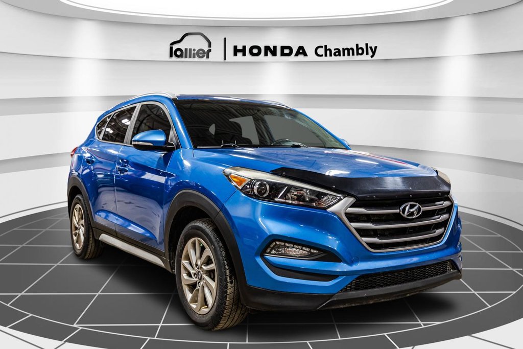 Hyundai Tucson 2.0L Premium AWD HEATED SEATS & STEERING WHEEL I MAGS I CAMERA I ACTIVE SECURITY I CARPLAY 2018 à Montréal, Québec - 9 - w1024h768px