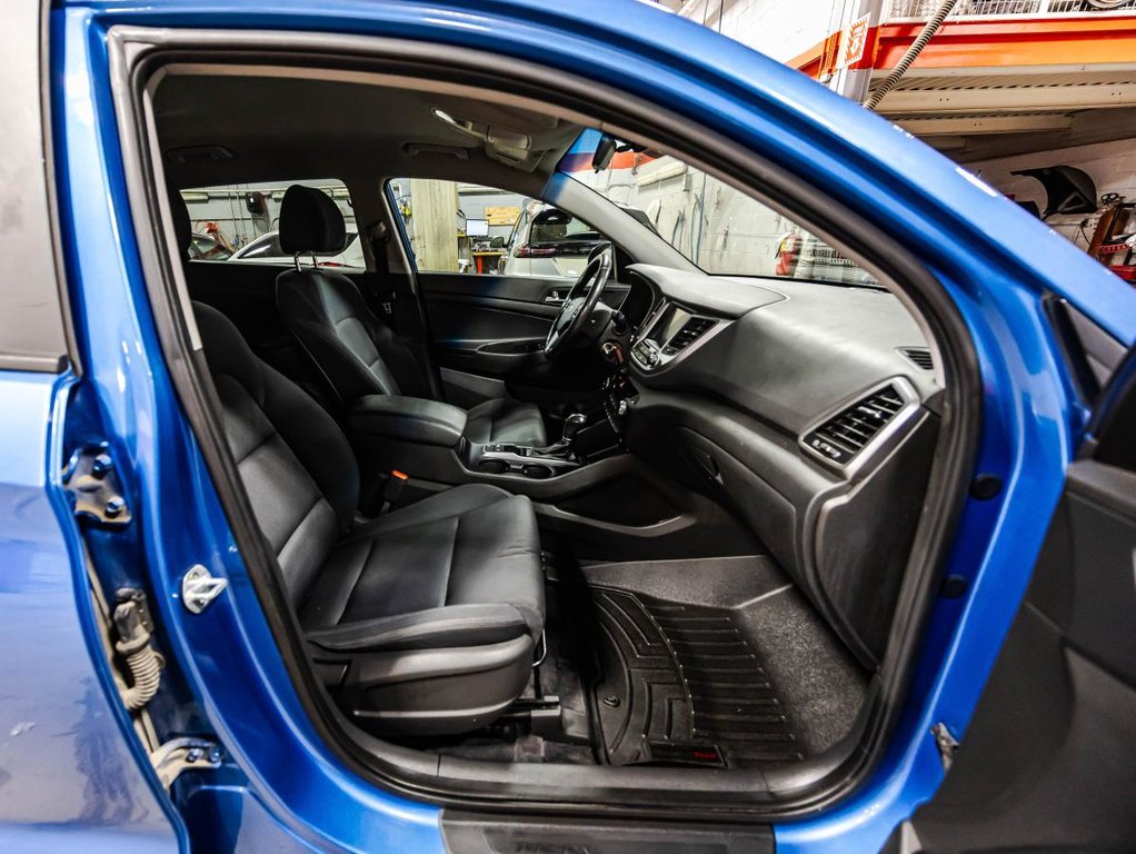 Hyundai Tucson 2.0L Premium AWD HEATED SEATS & STEERING WHEEL I MAGS I CAMERA I ACTIVE SECURITY I CARPLAY 2018 à Montréal, Québec - 18 - w1024h768px