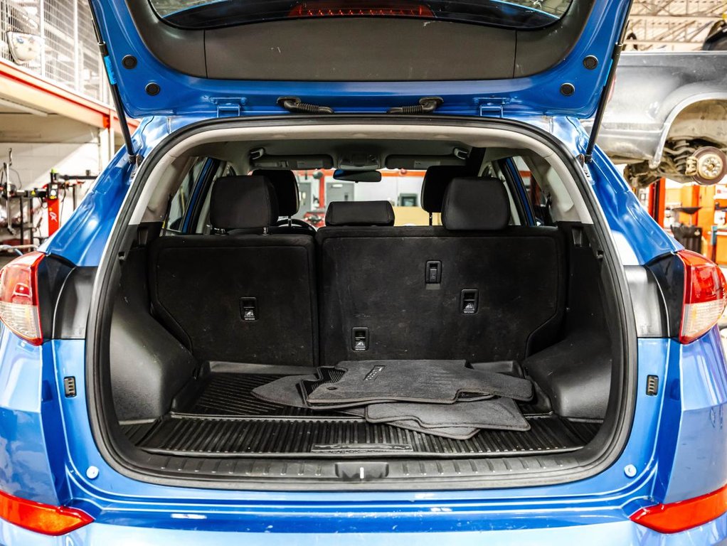 Hyundai Tucson 2.0L Premium AWD HEATED SEATS & STEERING WHEEL I MAGS I CAMERA I ACTIVE SECURITY I CARPLAY 2018 à Montréal, Québec - 16 - w1024h768px