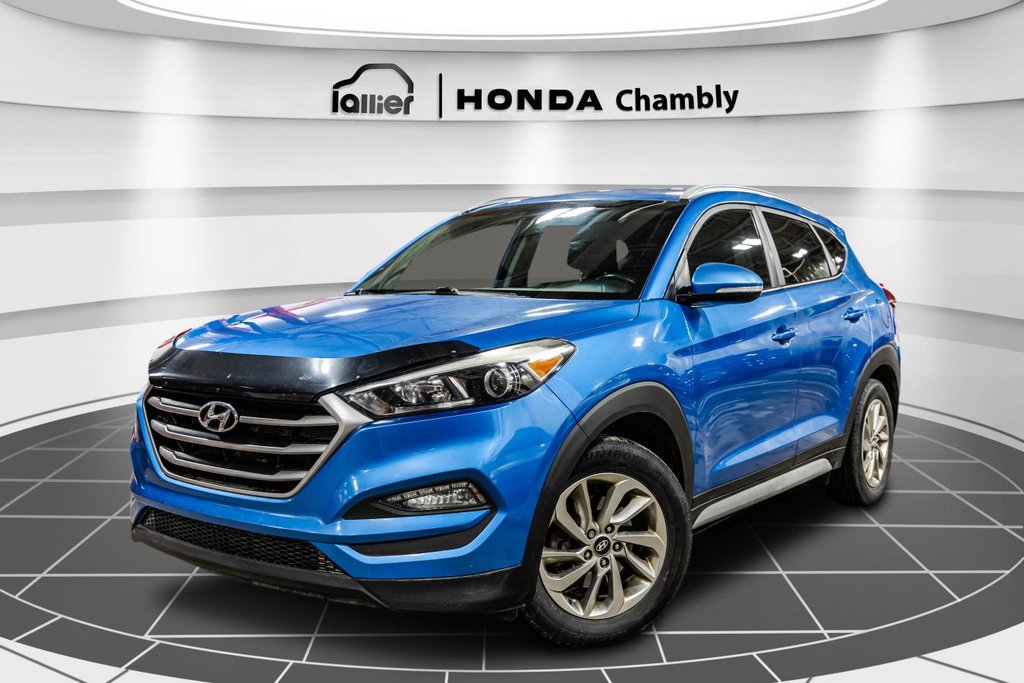 Hyundai Tucson 2.0L Premium AWD HEATED SEATS & STEERING WHEEL I MAGS I CAMERA I ACTIVE SECURITY I CARPLAY 2018 à Montréal, Québec - 1 - w1024h768px