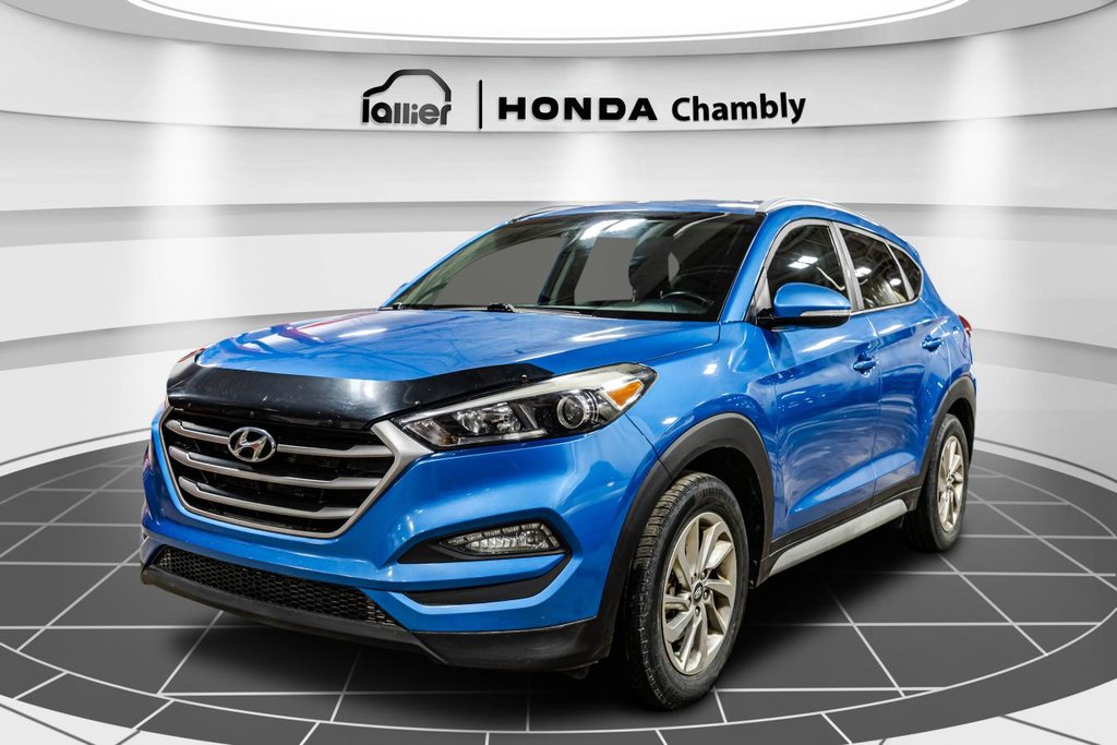 Hyundai Tucson 2.0L Premium AWD HEATED SEATS & STEERING WHEEL I MAGS I CAMERA I ACTIVE SECURITY I CARPLAY 2018 à Montréal, Québec - 3 - w1024h768px