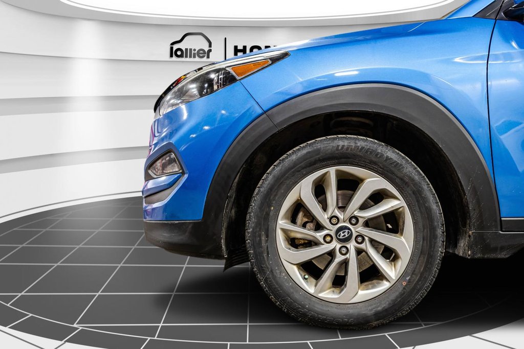 Hyundai Tucson 2.0L Premium AWD HEATED SEATS & STEERING WHEEL I MAGS I CAMERA I ACTIVE SECURITY I CARPLAY 2018 à Montréal, Québec - 10 - w1024h768px