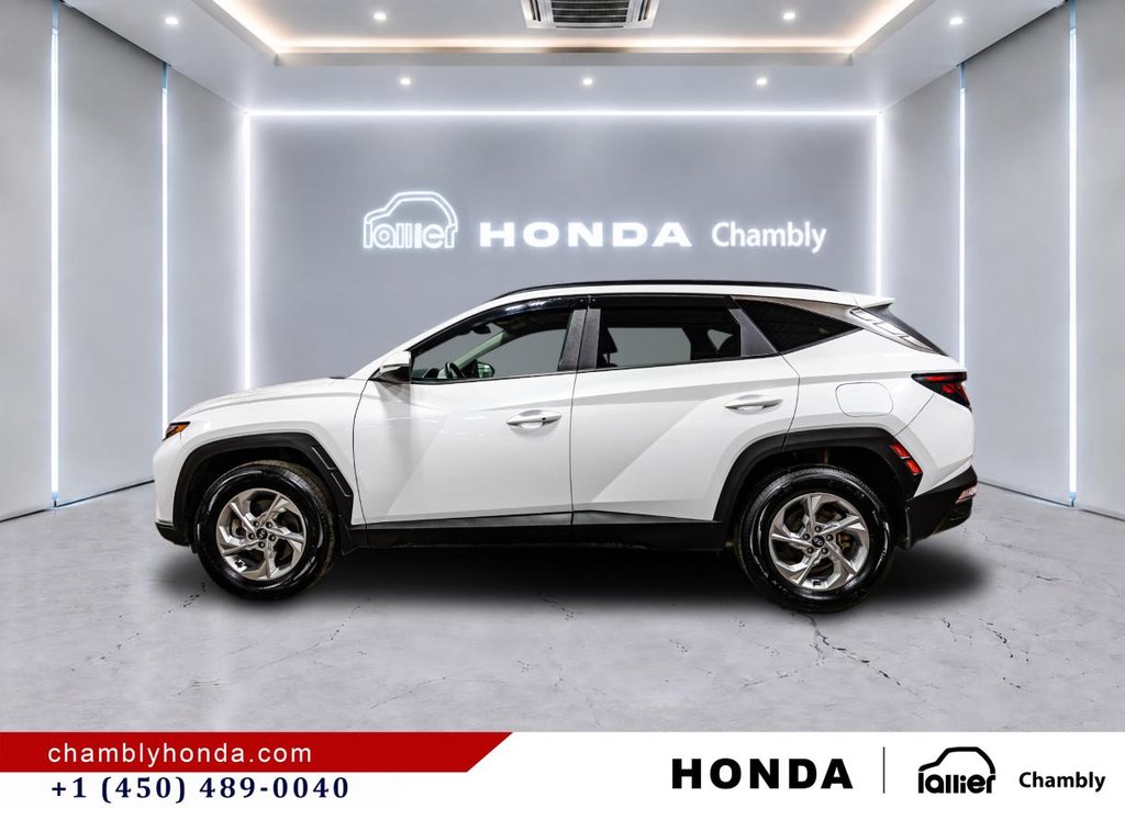 Hyundai Tucson Preferred AWD I MAGS I HEATED SEATS AND STEERING WHEEL I CARPLAY I CAMERA I ACTIVE SECURITY 2023 à Montréal, Québec - 4 - w1024h768px