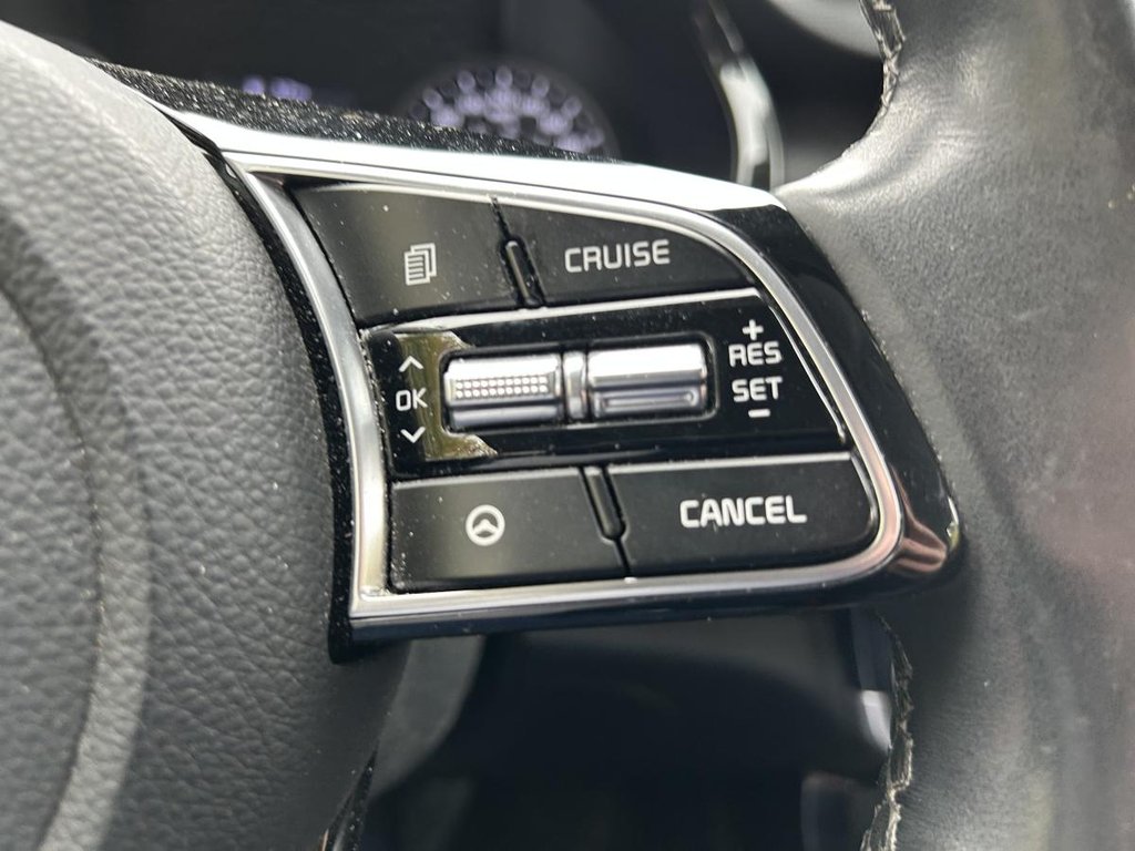 2023 Kia Seltos EX MAGS I SHEATED SEATS AND STEERING WHEEL I CARPLAY I CAMERA IU STERTER I ACTIVE SECURITY in Montréal, Quebec - 9 - w1024h768px