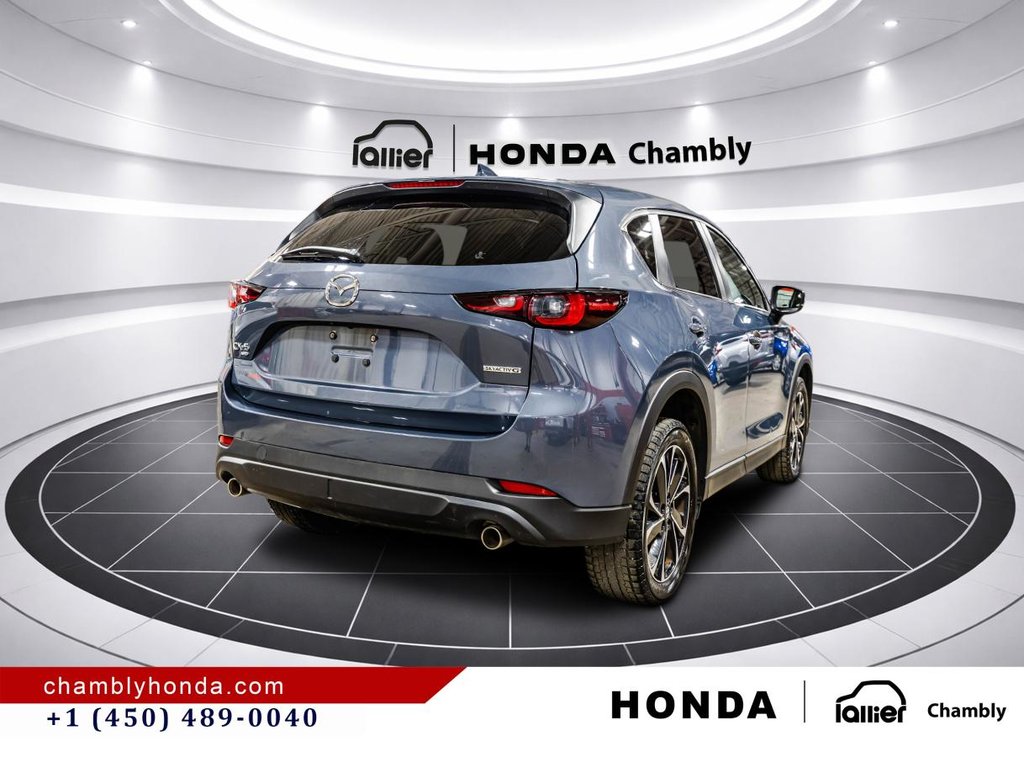 Mazda CX-5 GS AWD SUNROOF I MAGS I LEATHER 7 SUEDE I HEATED SEATS IO CARPLAY I ACTIVE SECURITY 2023 à Montréal, Québec - 7 - w1024h768px