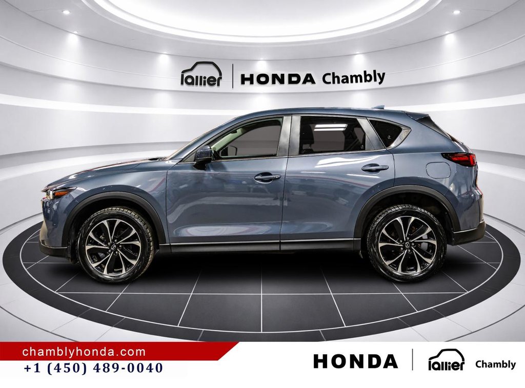 Mazda CX-5 GS AWD SUNROOF I MAGS I LEATHER 7 SUEDE I HEATED SEATS IO CARPLAY I ACTIVE SECURITY 2023 à Montréal, Québec - 4 - w1024h768px