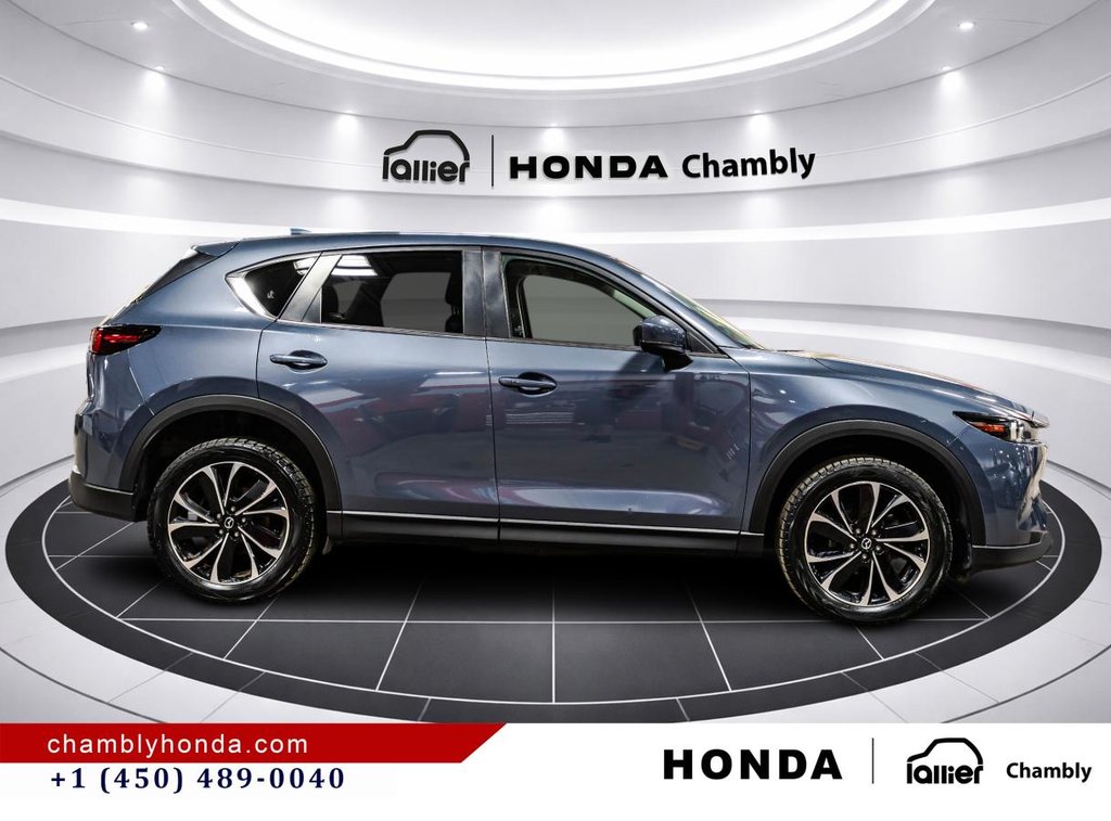 Mazda CX-5 GS AWD SUNROOF I MAGS I LEATHER 7 SUEDE I HEATED SEATS IO CARPLAY I ACTIVE SECURITY 2023 à Montréal, Québec - 8 - w1024h768px