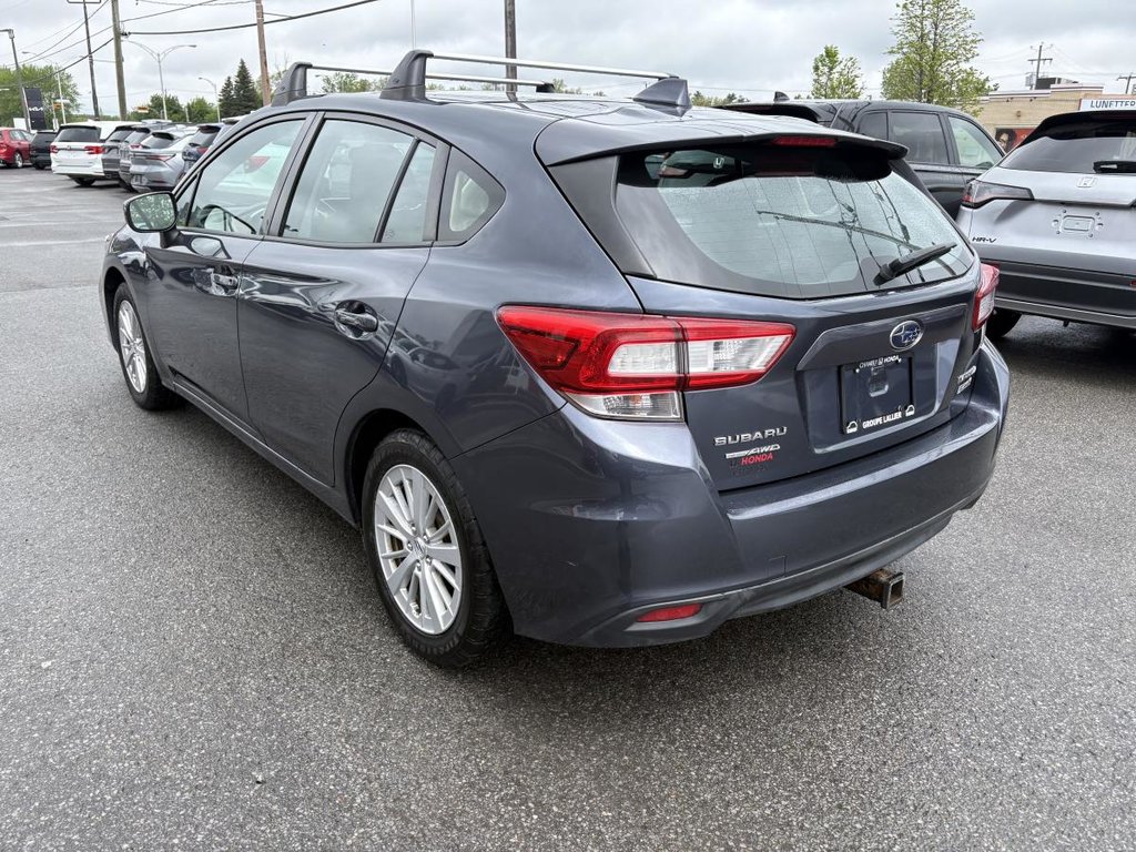 2017 Subaru Impreza Touring HATCHABACK i MANUAL TRANSMISSION I HEATED SEATS I BLUETOOTH I CAMERA in Montréal, Quebec - 4 - w1024h768px