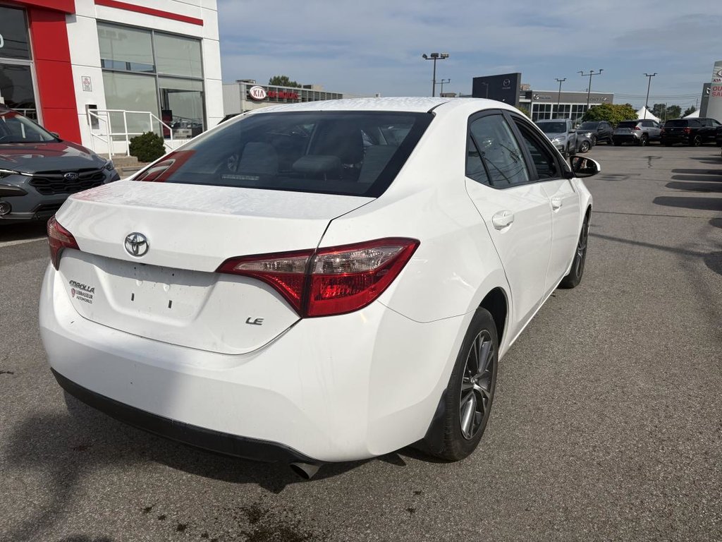2018 Toyota Corolla LE 70,000 KM I HEATED SEATS AND STEERING WHEEL I CAMERA  I SUNROOF I MAGS I  ACTIVE SECURITY in Montréal, Quebec - 5 - w1024h768px