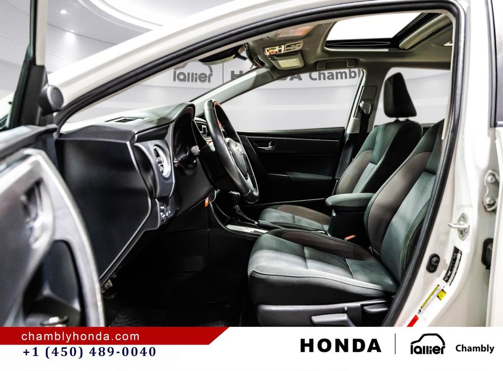 2018 Toyota Corolla LE 70,000 KM I HEATED SEATS AND STEERING WHEEL I CAMERA  I SUNROOF I MAGS I  ACTIVE SECURITY in Montréal, Quebec - 19 - w1024h768px