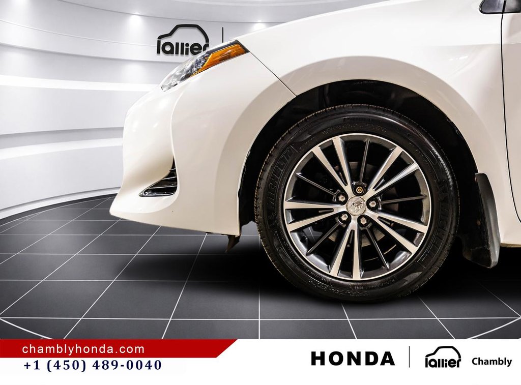 2018 Toyota Corolla LE 70,000 KM I HEATED SEATS AND STEERING WHEEL I CAMERA  I SUNROOF I MAGS I  ACTIVE SECURITY in Montréal, Quebec - 10 - w1024h768px