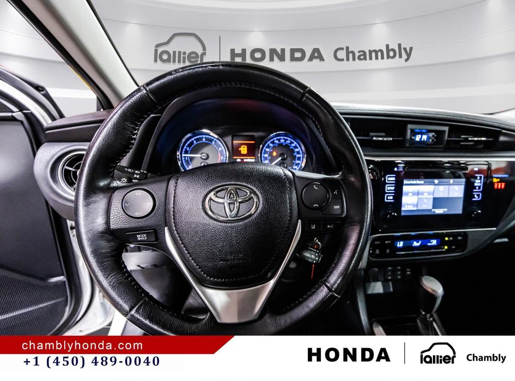 2018 Toyota Corolla LE 70,000 KM I HEATED SEATS AND STEERING WHEEL I CAMERA  I SUNROOF I MAGS I  ACTIVE SECURITY in Montréal, Quebec - 22 - w1024h768px