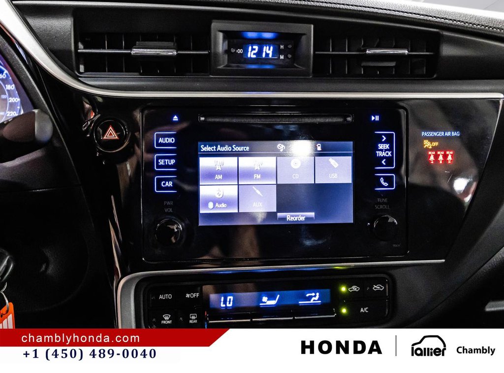 2018 Toyota Corolla LE 70,000 KM I HEATED SEATS AND STEERING WHEEL I CAMERA  I SUNROOF I MAGS I  ACTIVE SECURITY in Montréal, Quebec - 24 - w1024h768px