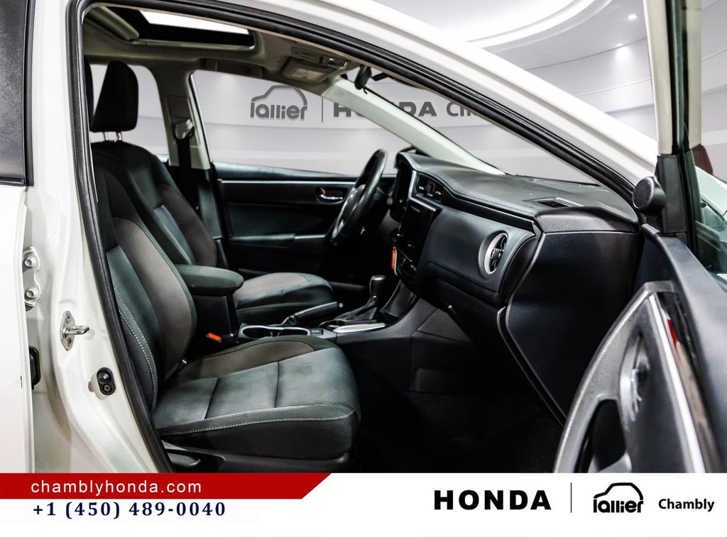 2018 Toyota Corolla LE 70,000 KM I HEATED SEATS AND STEERING WHEEL I CAMERA  I SUNROOF I MAGS I  ACTIVE SECURITY in Montréal, Quebec - 17 - w1024h768px