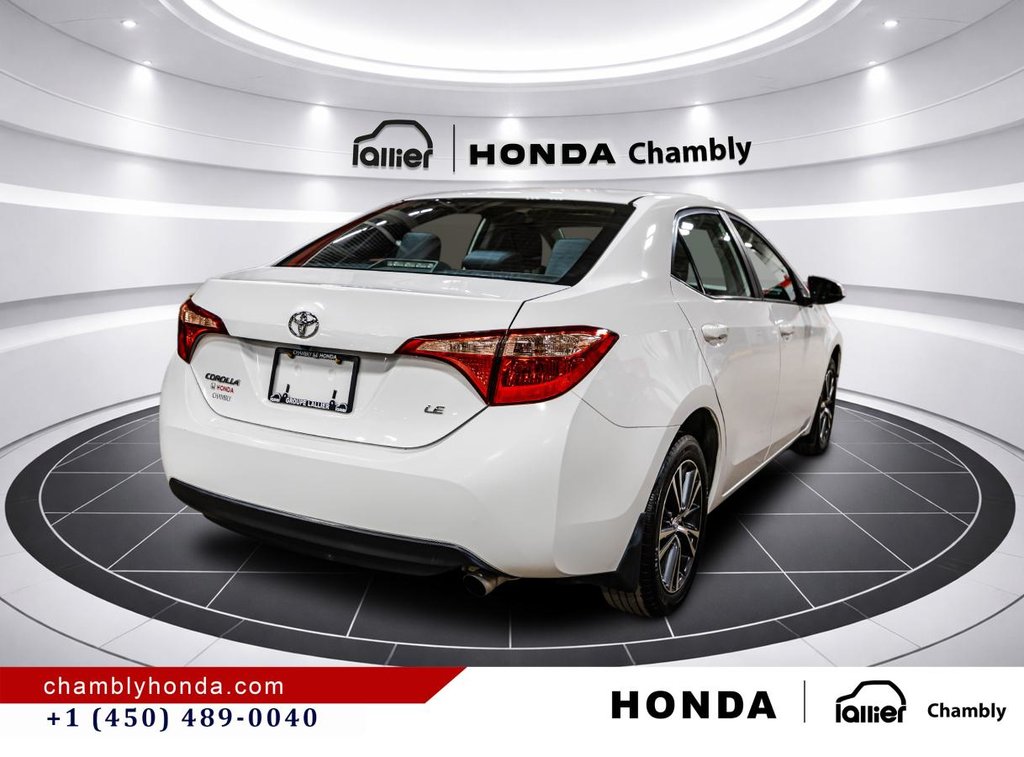 2018 Toyota Corolla LE 70,000 KM I HEATED SEATS AND STEERING WHEEL I CAMERA  I SUNROOF I MAGS I  ACTIVE SECURITY in Montréal, Quebec - 7 - w1024h768px
